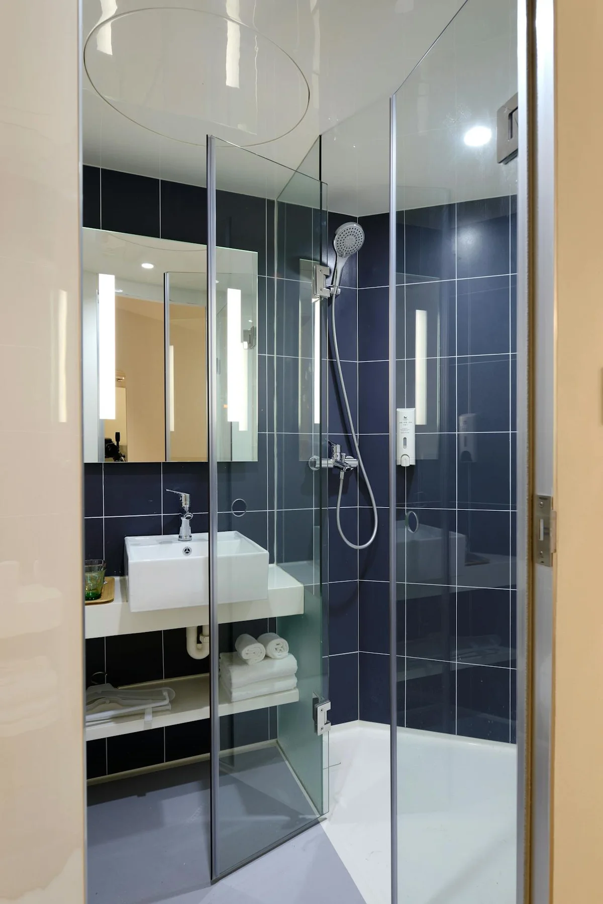 Walk-in shower with glass enclosure ideal for condo bathroom renovation