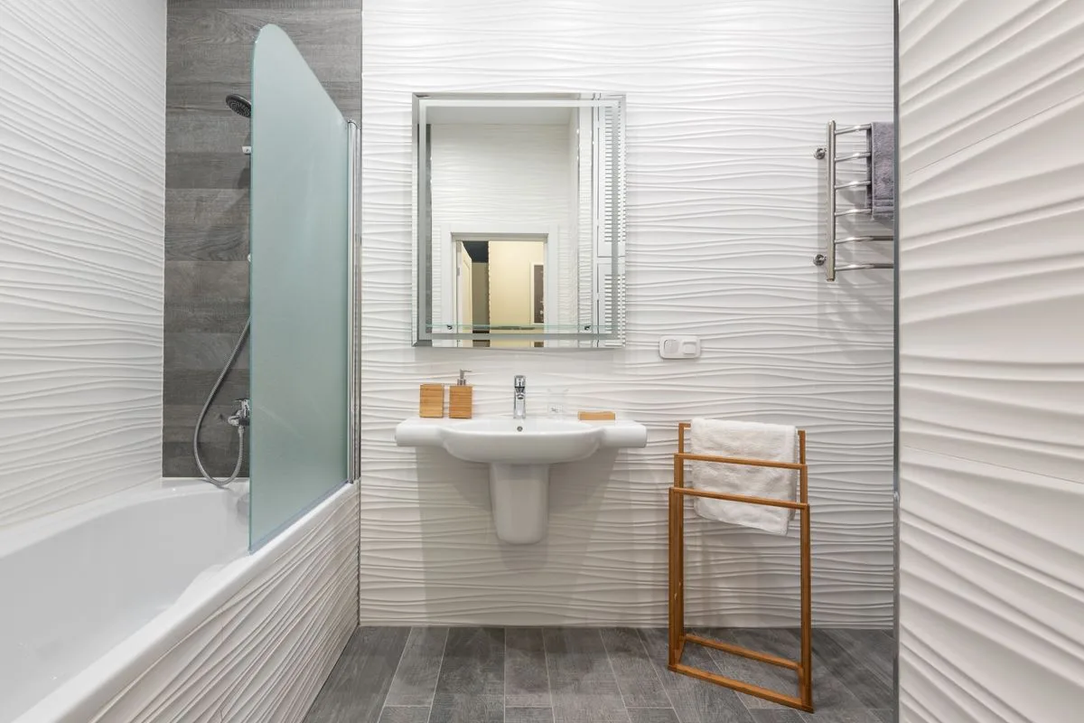 Walk-in tub installation with hand shower and accessible fixtures in a Vancouver BC bathroom
